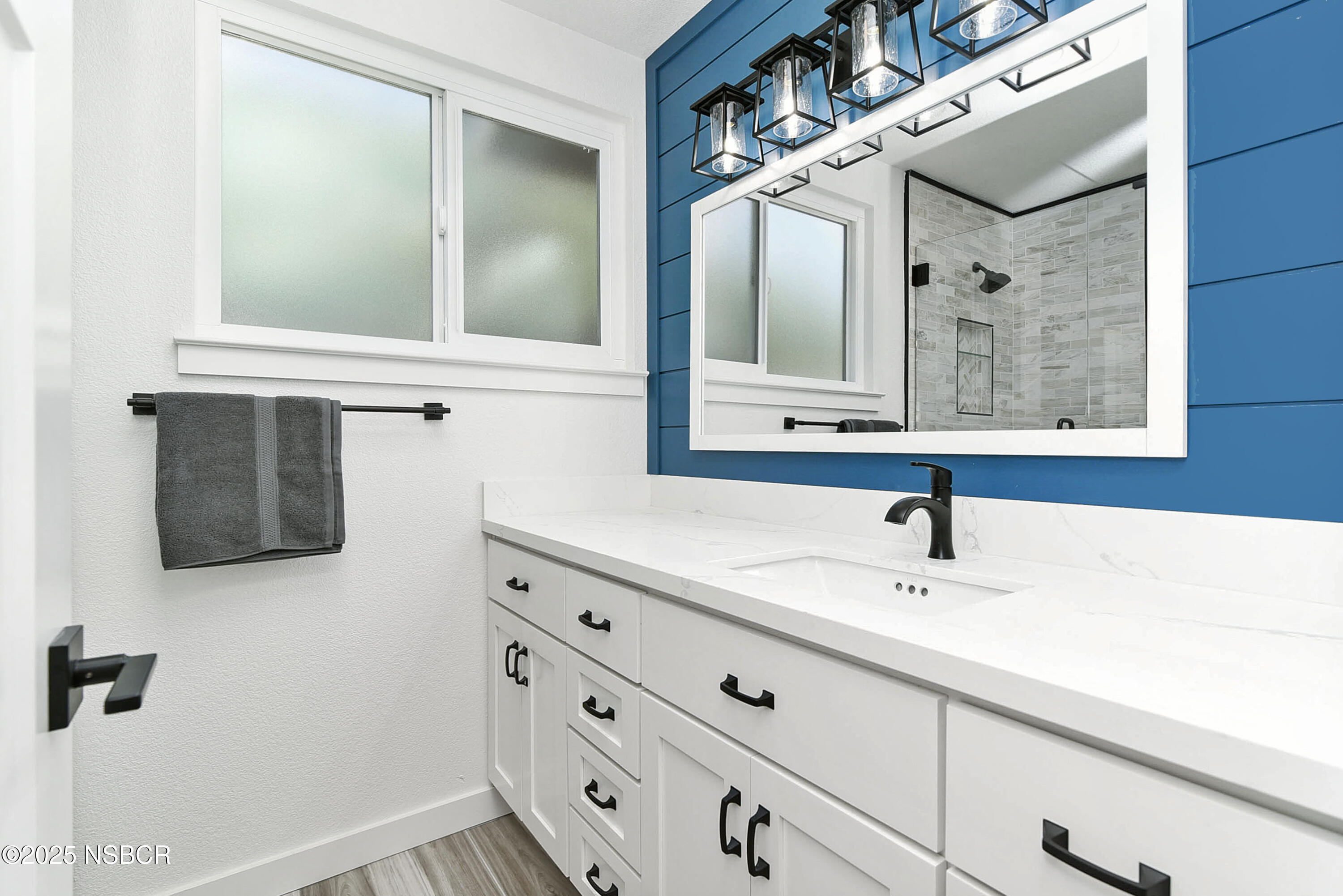 1133 Alden Avenue Lompoc, CA 93436 - Photo 19 of 27 a bathroom with a sink and a mirror