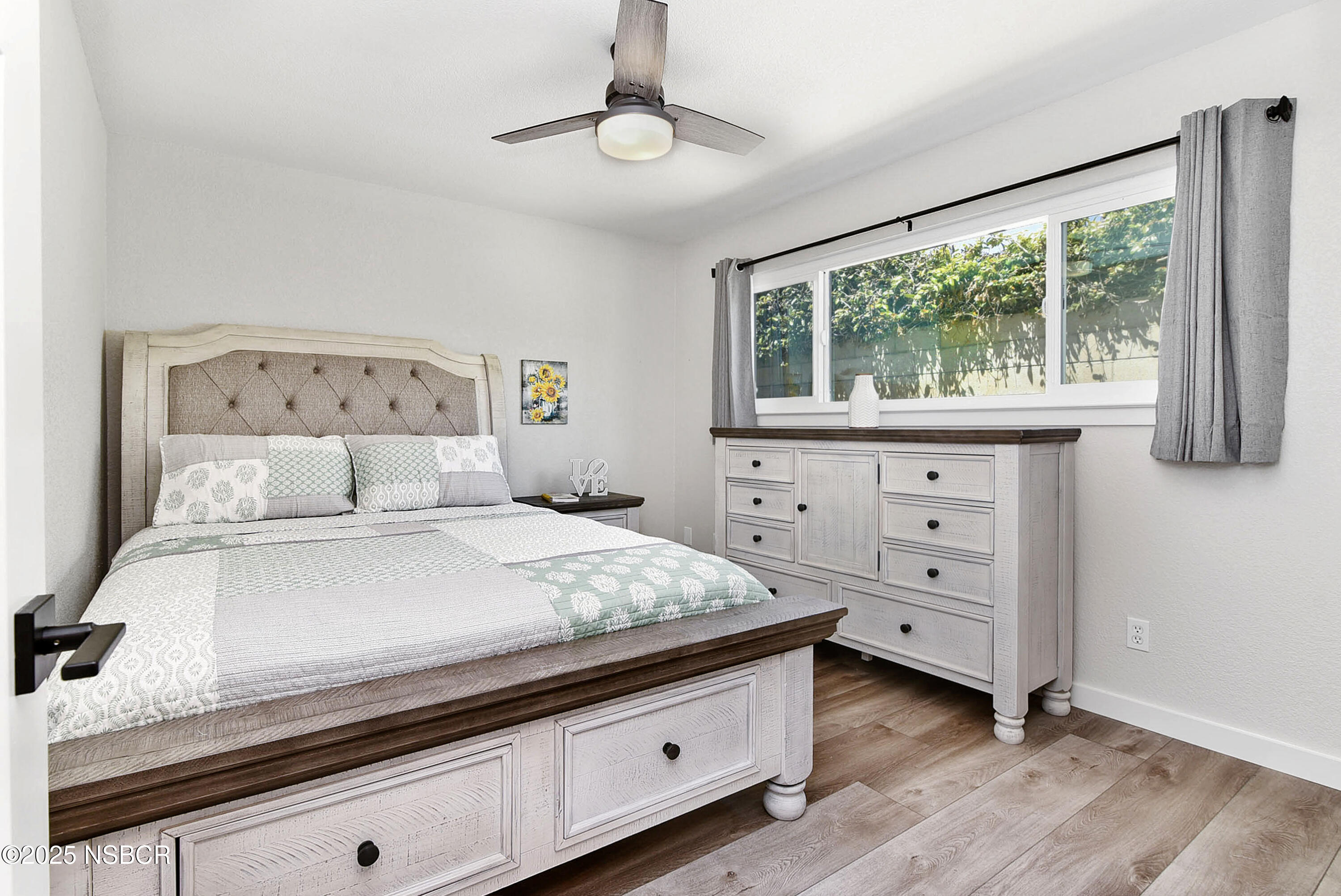 1133 Alden Avenue Lompoc, CA 93436 - Photo 22 of 27 a bedroom with a bed and a window