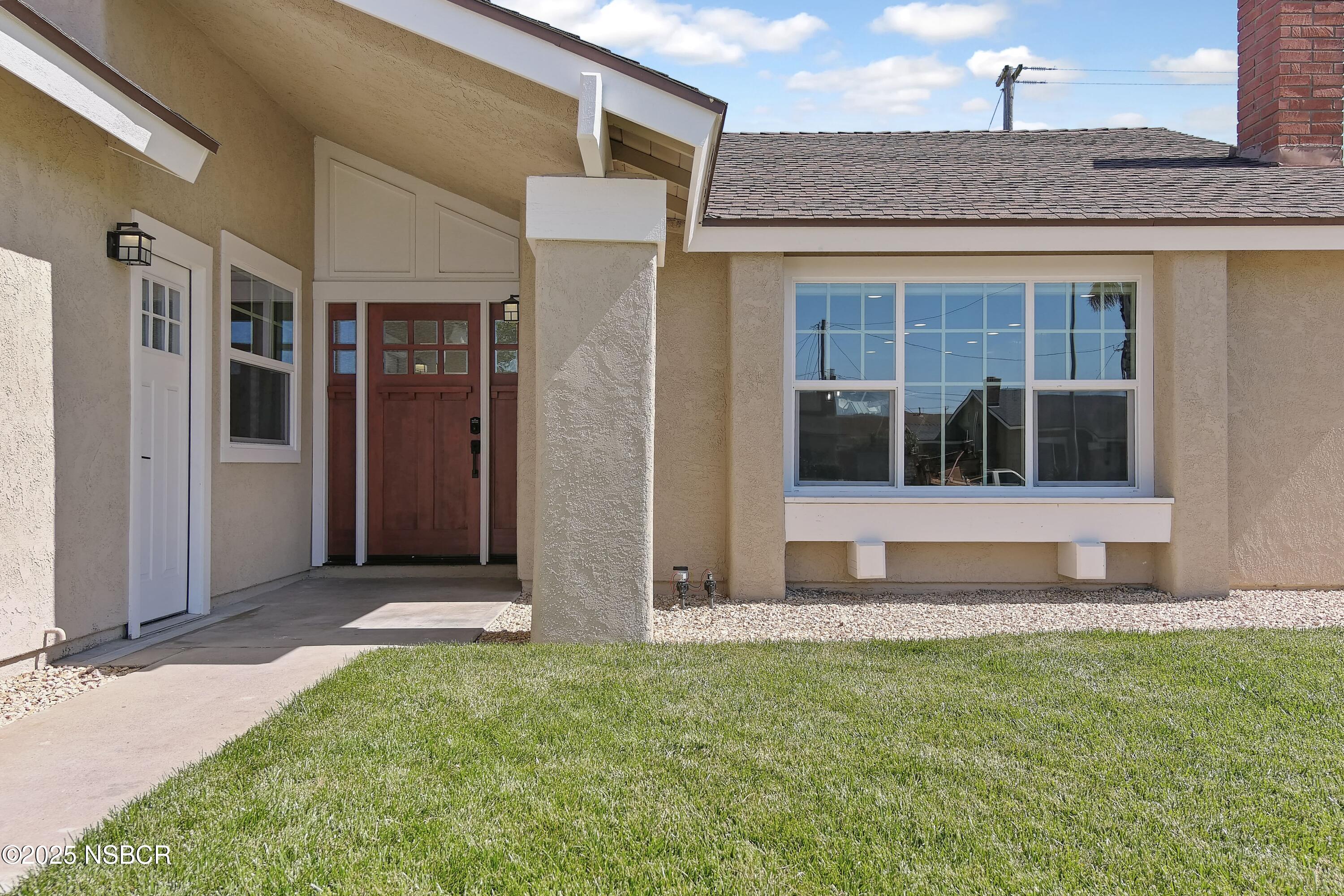 1133 Alden Avenue Lompoc, CA 93436 - Photo 6 of 27 a view of house with front door