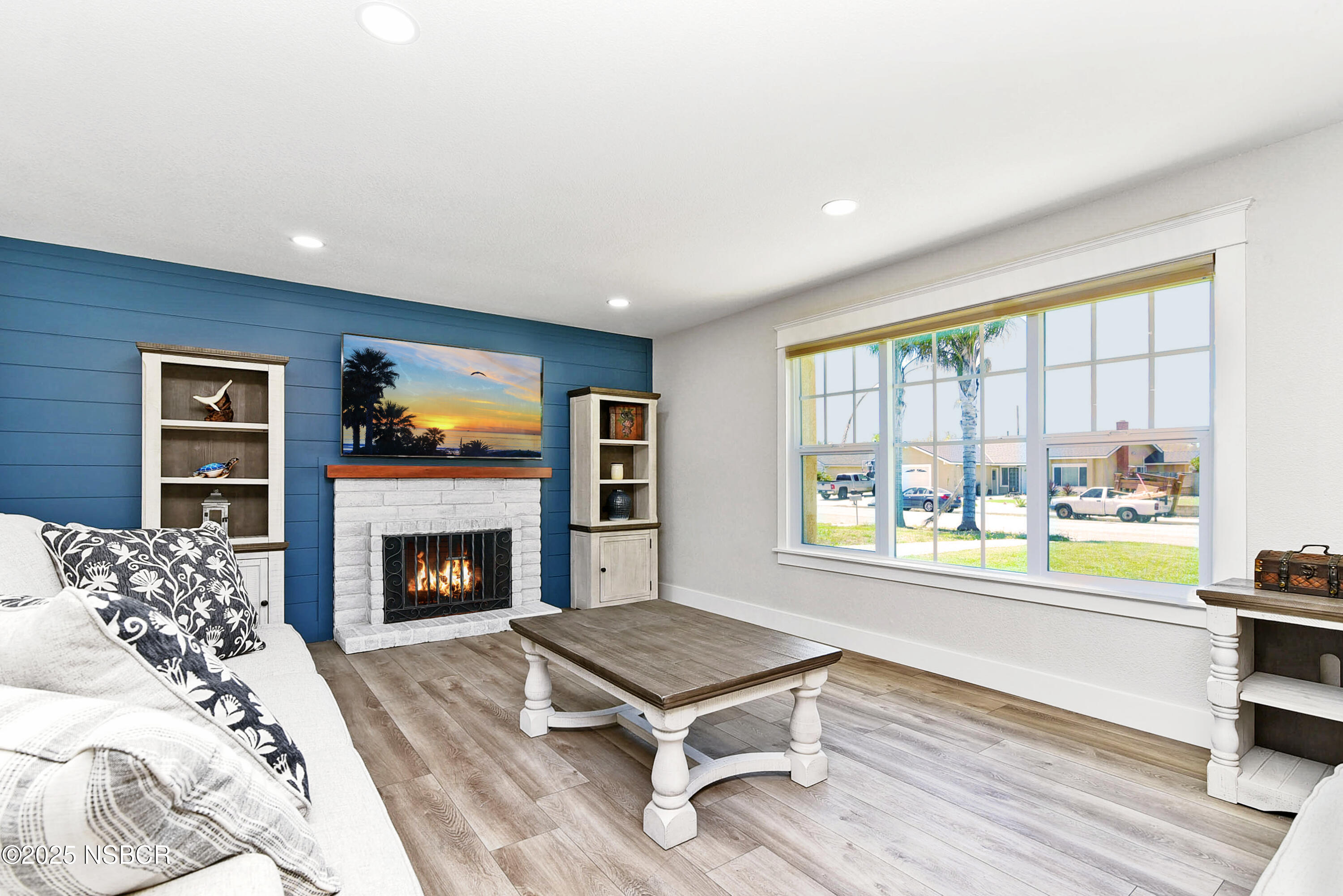 1133 Alden Avenue Lompoc, CA 93436 - Photo 7 of 27 a living room with furniture and a fireplace