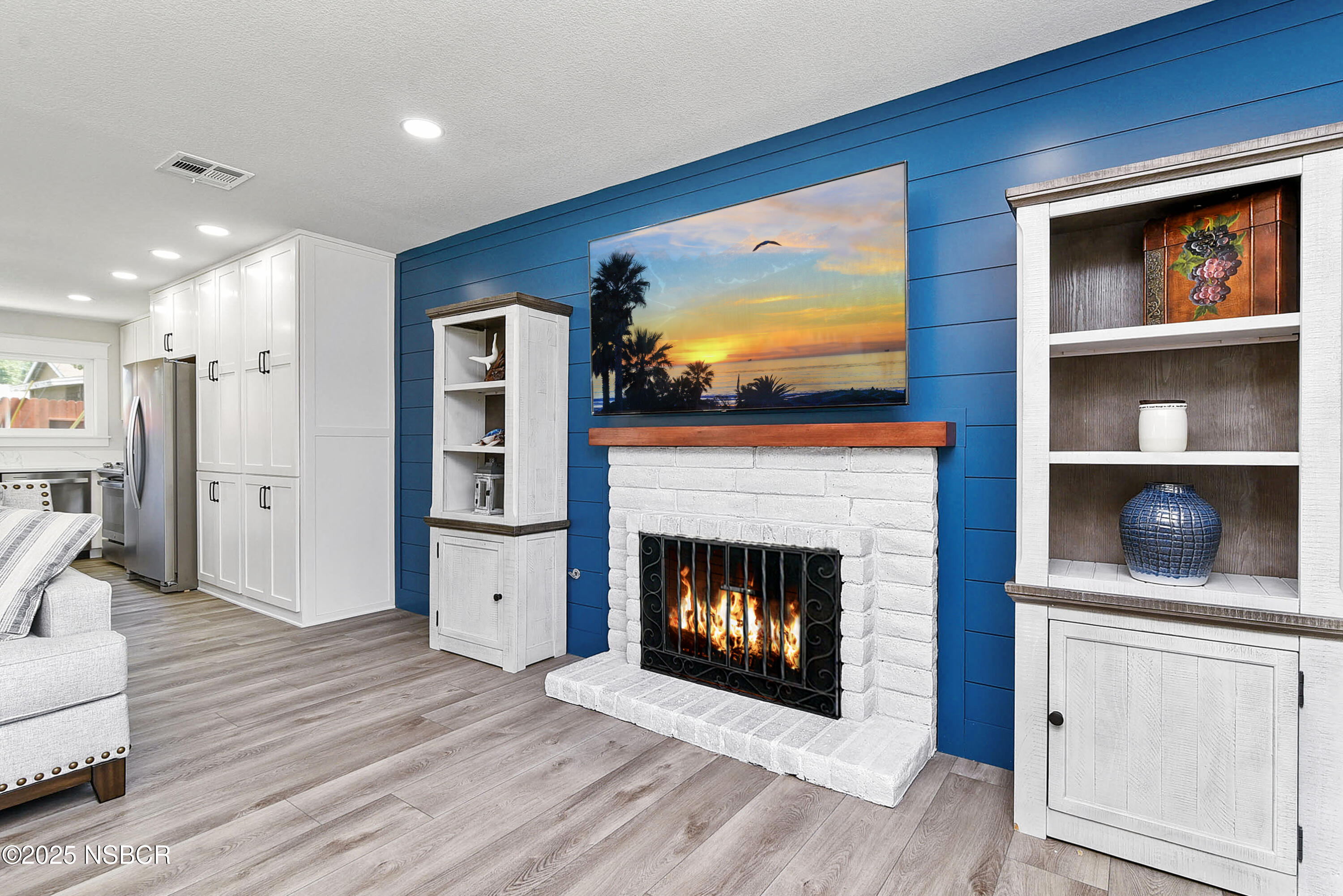 1133 Alden Avenue Lompoc, CA 93436 - Photo 9 of 27 a living room with furniture and a fireplace