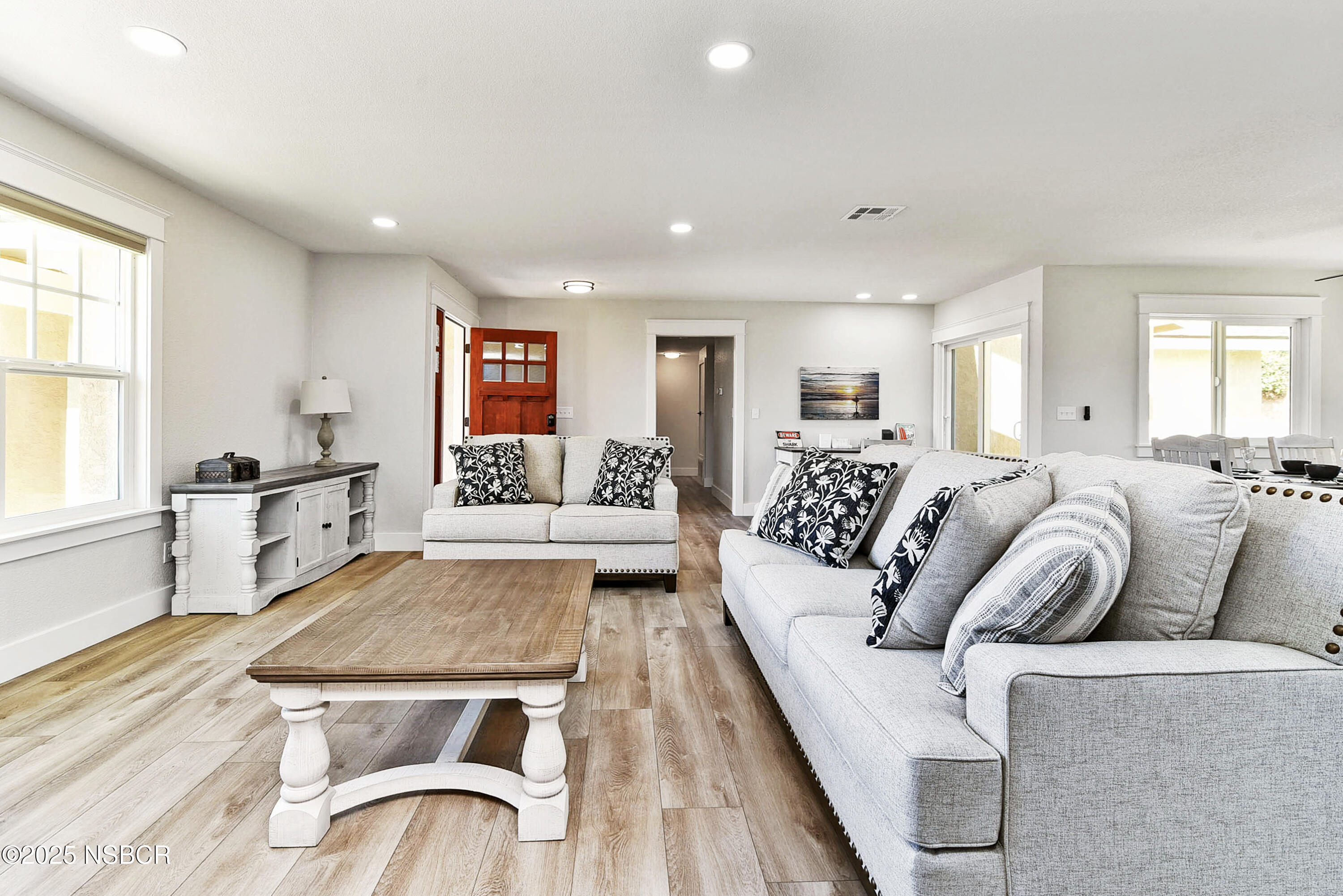 1133 Alden Avenue Lompoc, CA 93436 - Photo 10 of 27 a living room with furniture and a flat screen tv