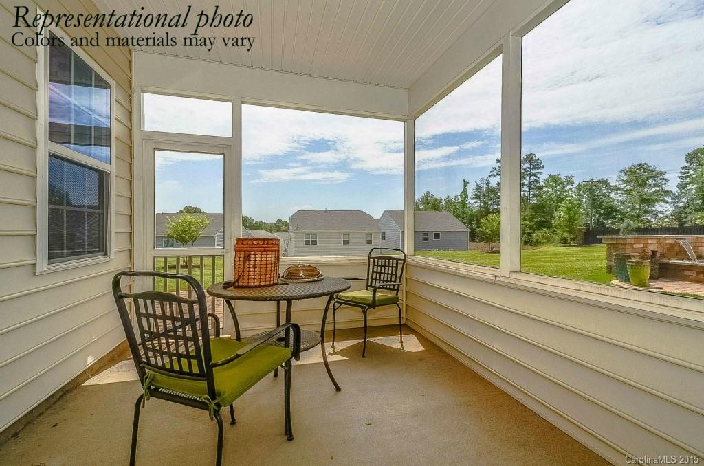 4270 Perth Road, Unit 312 Indian Land, SC 29707 - Photo 13 of 21 a balcony with couple of chairs and a potted plant