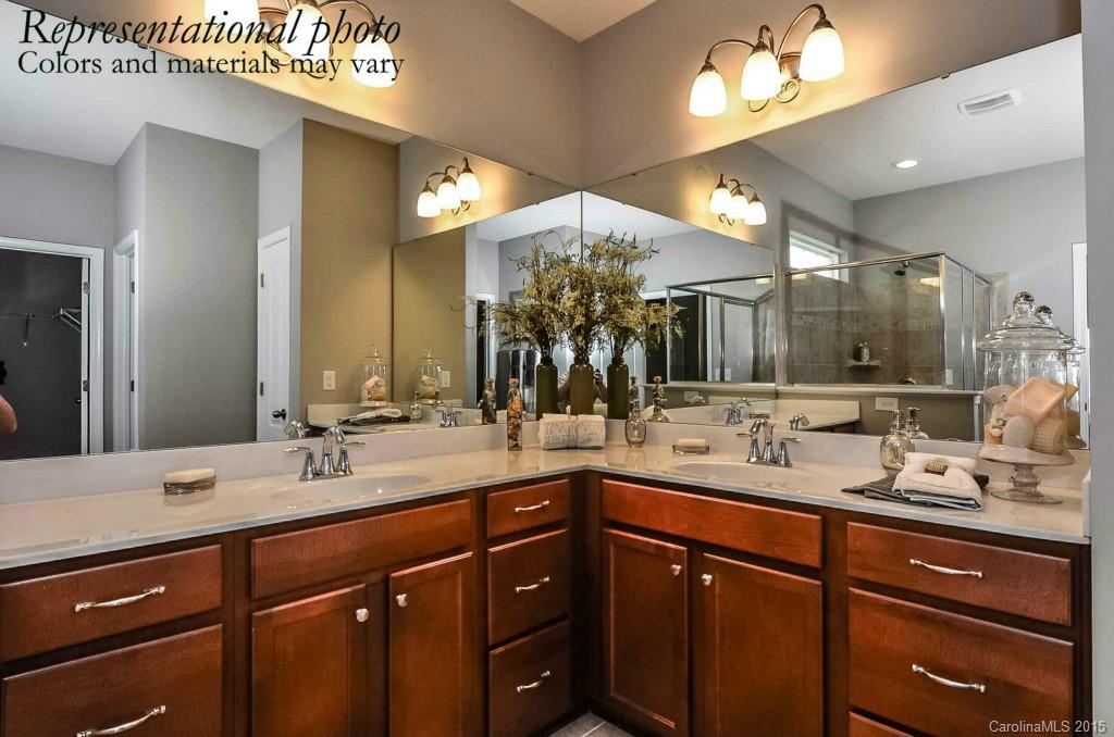 4270 Perth Road, Unit 312 Indian Land, SC 29707 - Photo 18 of 21 a bathroom with a double vanity sink and a mirror
