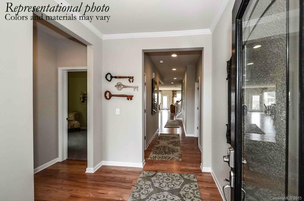 4270 Perth Road, Unit 312 Indian Land, SC 29707 - Photo 3 of 21 a view of a hallway with wooden floor and a bathroom