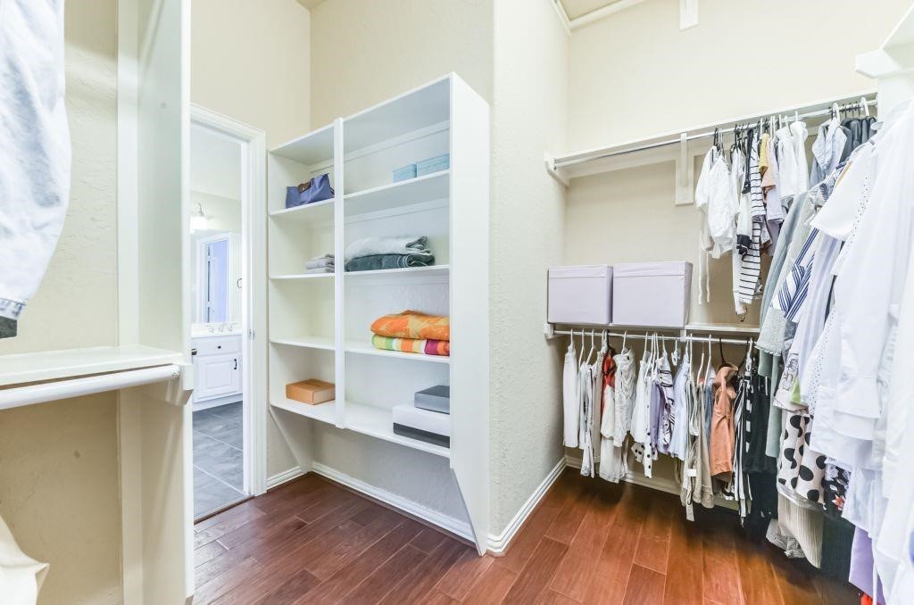 31 North Warbler Bend Circle Spring, TX 77382 - Photo 21 of 31 Spacious closet with built-ins in the primary bedroom.