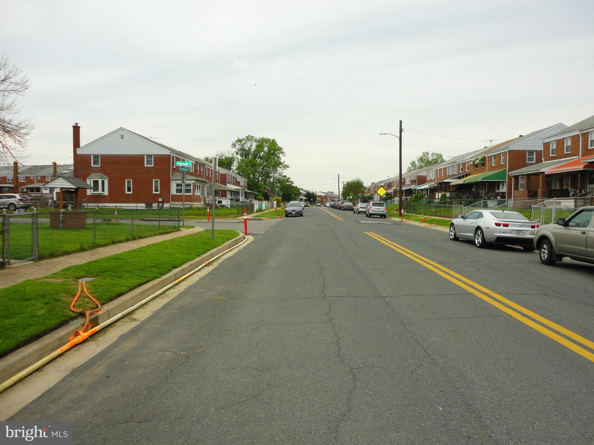 8539 Kavanagh Road Dundalk, MD 21222 - Photo 3 of 4 a view of a city street with tall buildings