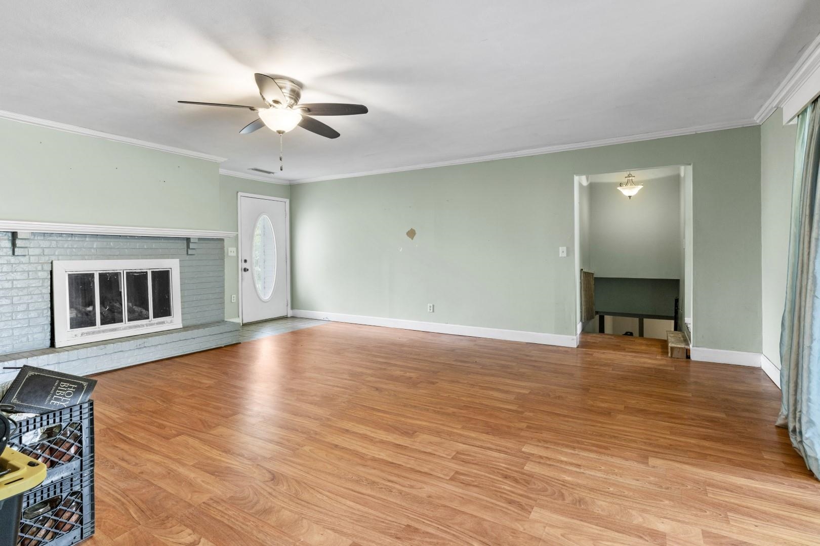 8530 North Kishwaukee Road Stillman Valley, IL 61084 - Photo 14 of 44 a view of livingroom with hardwood floor and ceiling fan