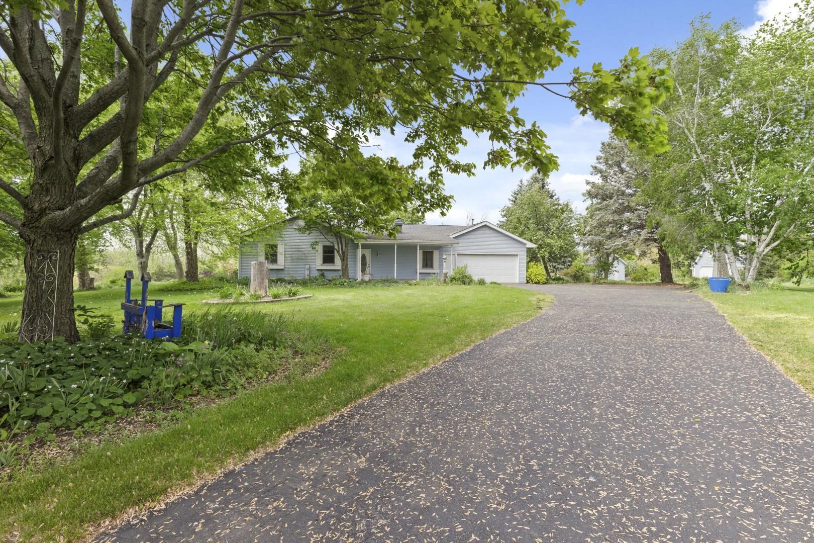 8530 North Kishwaukee Road Stillman Valley, IL 61084 - Photo 2 of 44 a view of house with outdoor space and tree s