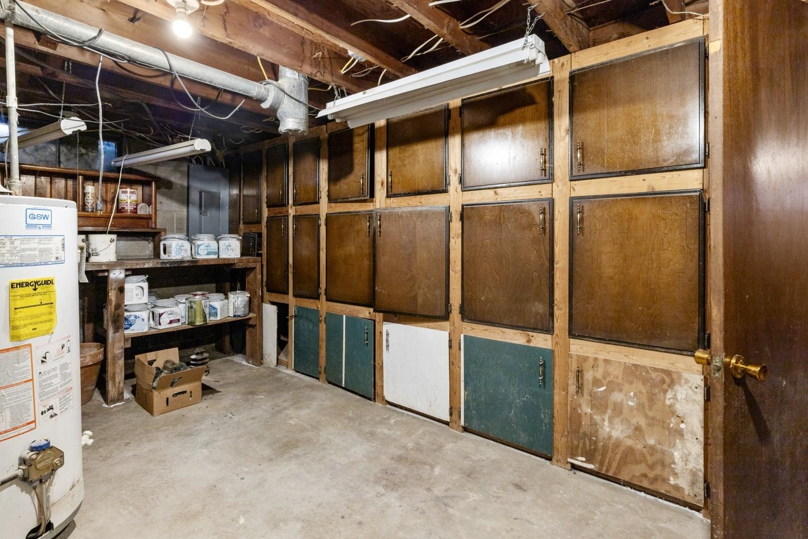 8530 North Kishwaukee Road Stillman Valley, IL 61084 - Photo 26 of 44 a view of walk in closet with clothes and shoes