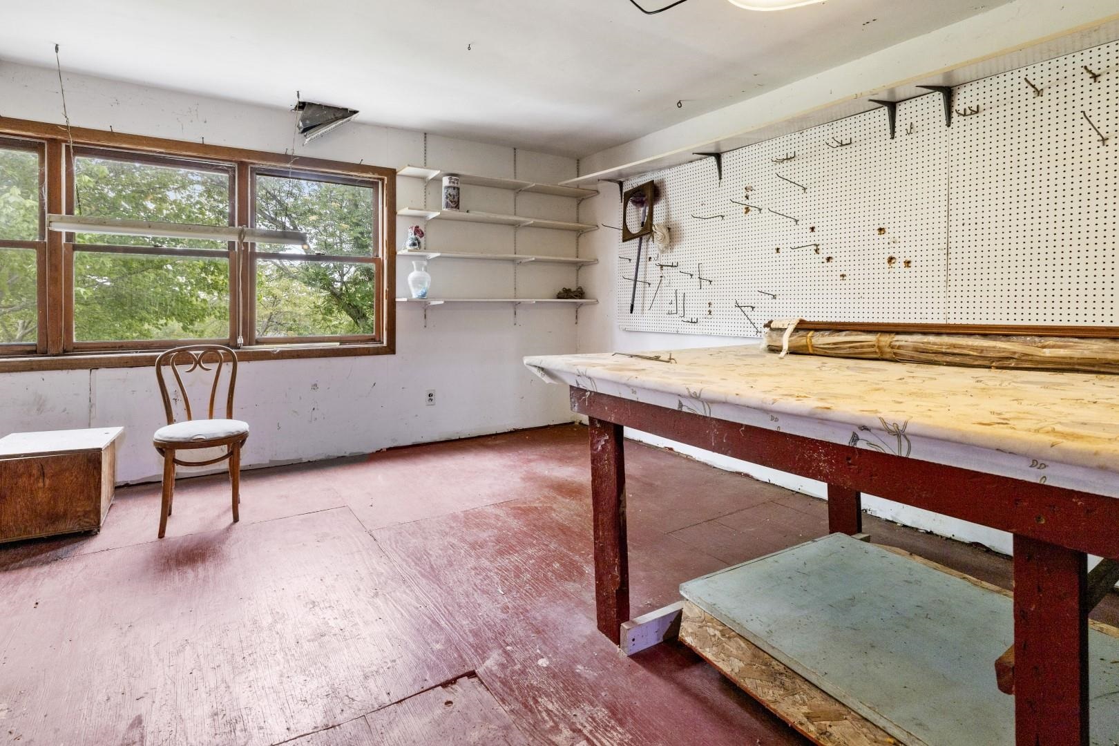 8530 North Kishwaukee Road Stillman Valley, IL 61084 - Photo 27 of 44 a living room with furniture and a large window