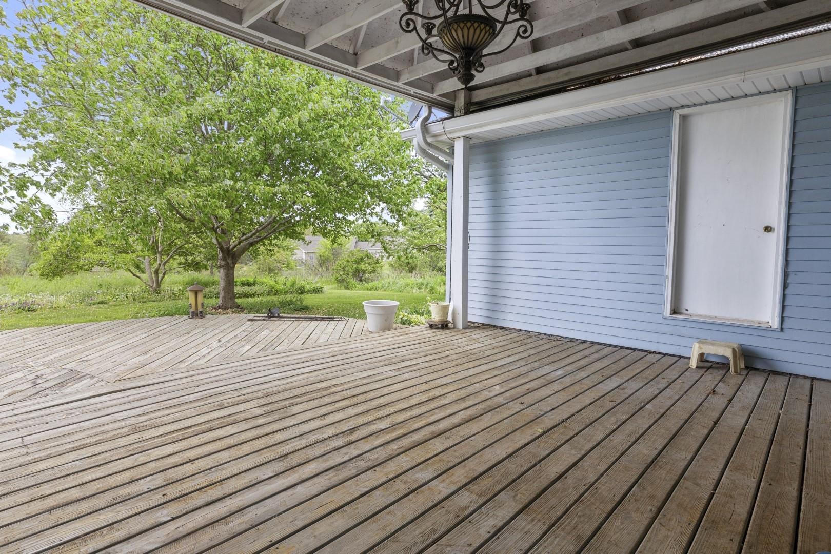 8530 North Kishwaukee Road Stillman Valley, IL 61084 - Photo 31 of 44 a view of outdoor space and deck