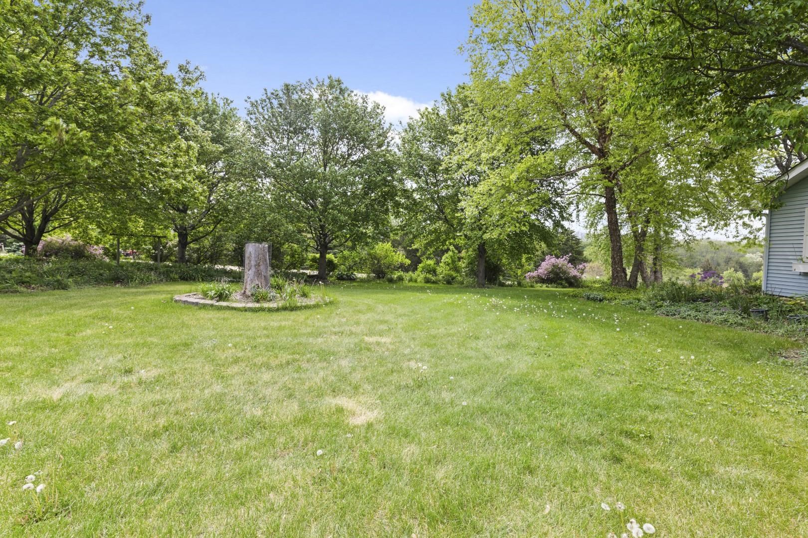 8530 North Kishwaukee Road Stillman Valley, IL 61084 - Photo 35 of 44 a swimming pool with trees in the background