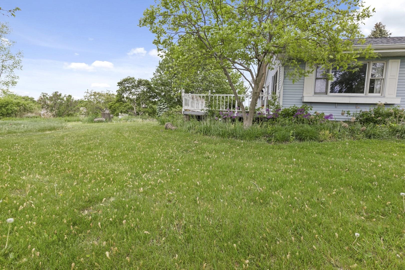 8530 North Kishwaukee Road Stillman Valley, IL 61084 - Photo 37 of 44 a view of a house with a yard