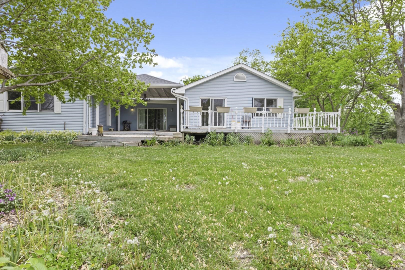 8530 North Kishwaukee Road Stillman Valley, IL 61084 - Photo 44 of 44 a front view of house with yard and green space