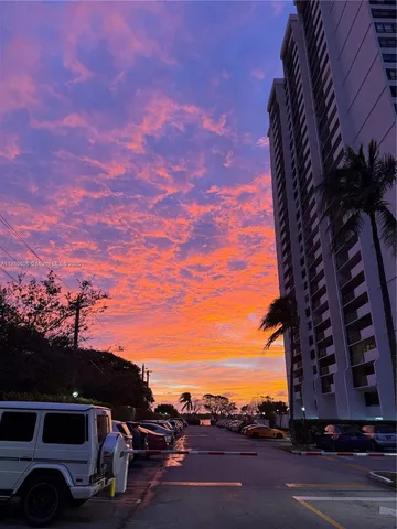 a view of a lake with outdoor seating space