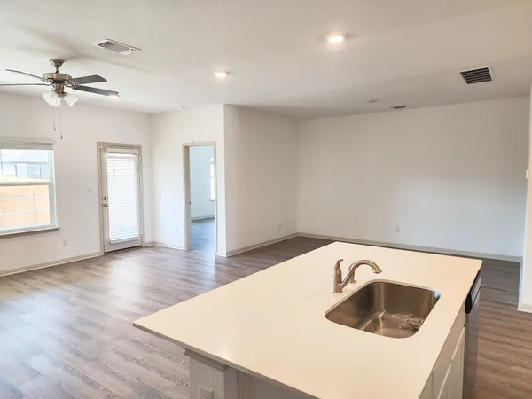 a view of kitchen and sink
