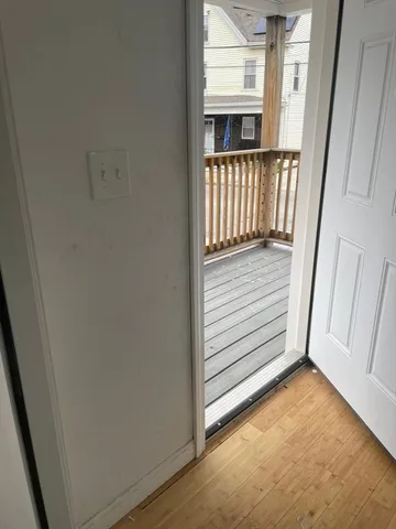 a view of a room that has a window