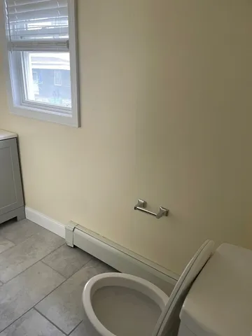 a bathroom with a sink and toilet