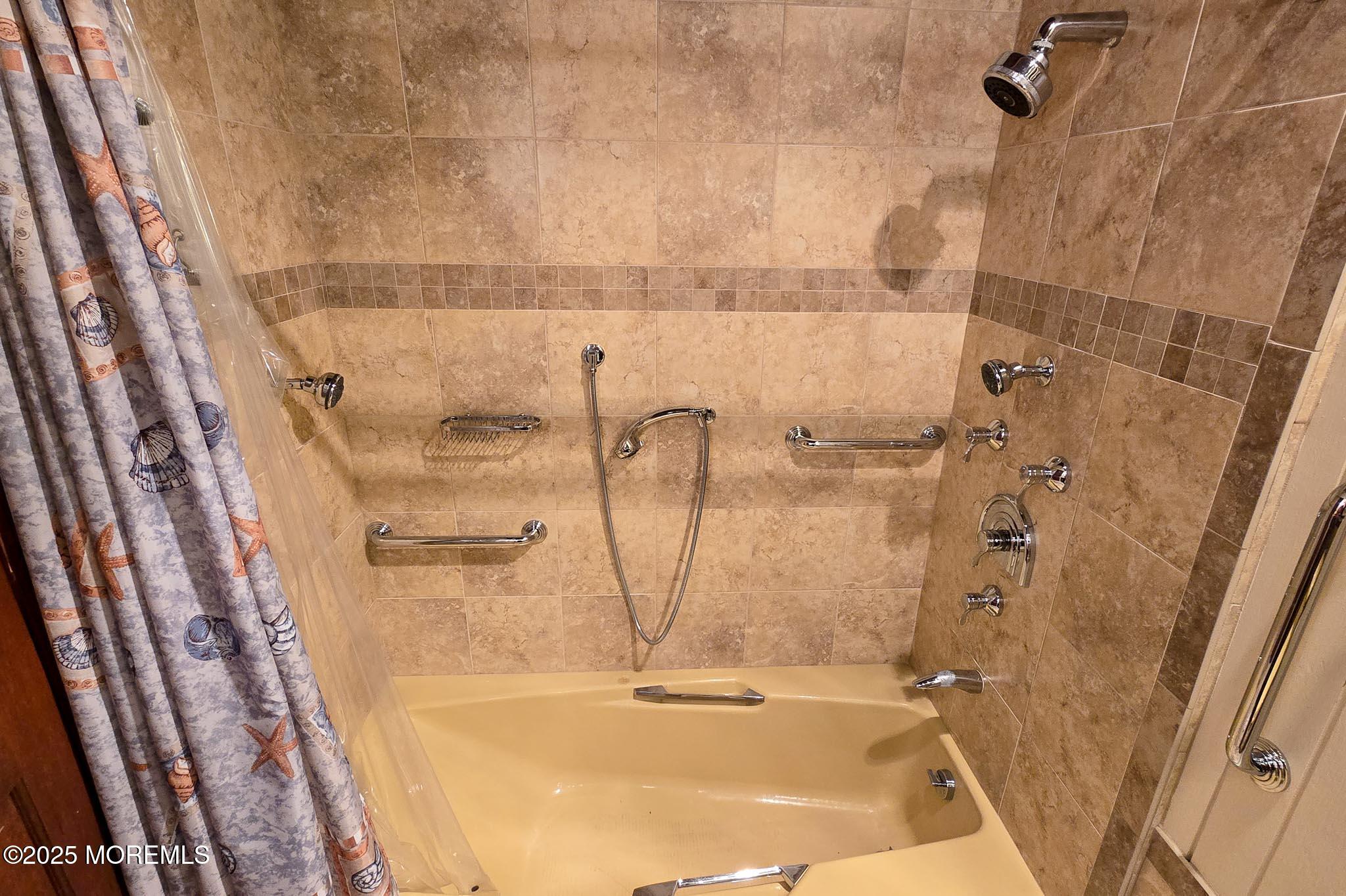 72 Pershing Boulevard Lavallette, NJ 08735 - Photo 17 of 48 a bathroom with a shower