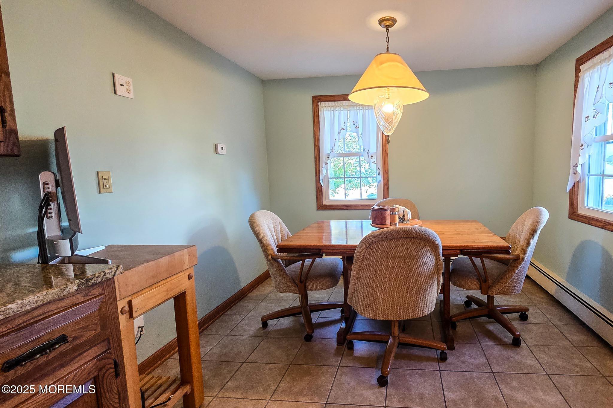 72 Pershing Boulevard Lavallette, NJ 08735 - Photo 26 of 48 a dining room with furniture and window