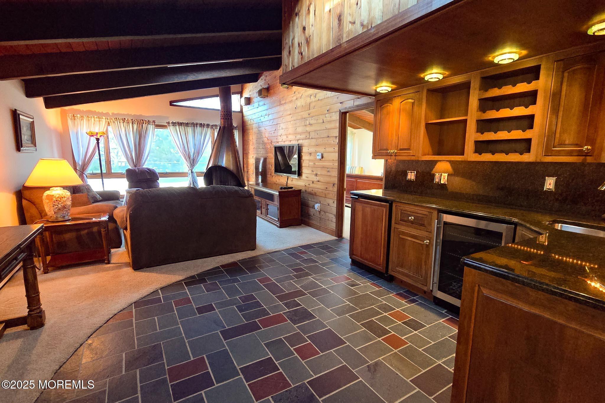 72 Pershing Boulevard Lavallette, NJ 08735 - Photo 9 of 48 a kitchen with stainless steel appliances granite countertop a sink and a stove