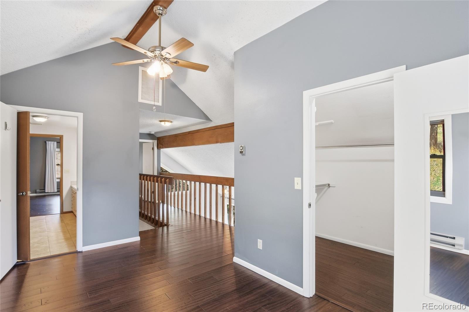 6136 High Drive Morrison, CO 80465 - Photo 12 of 40 wooden floor in an empty room with a window