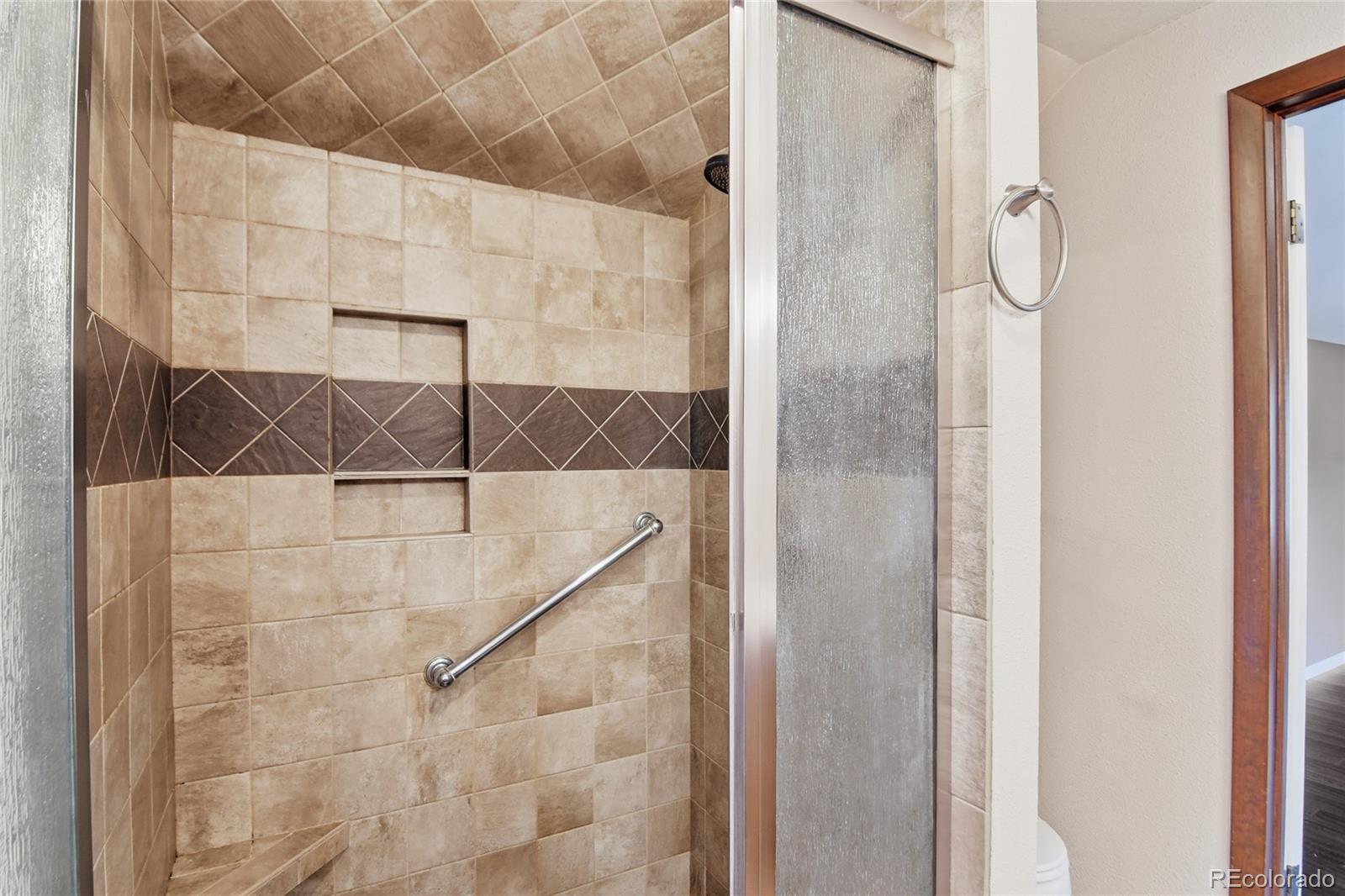 6136 High Drive Morrison, CO 80465 - Photo 15 of 40 a bathroom with a shower