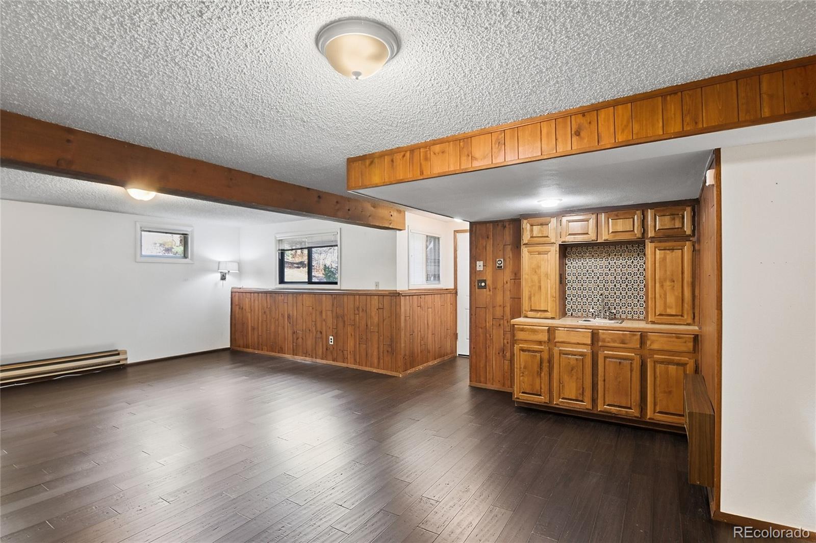 6136 High Drive Morrison, CO 80465 - Photo 19 of 40 a view of an empty room and wooden floor