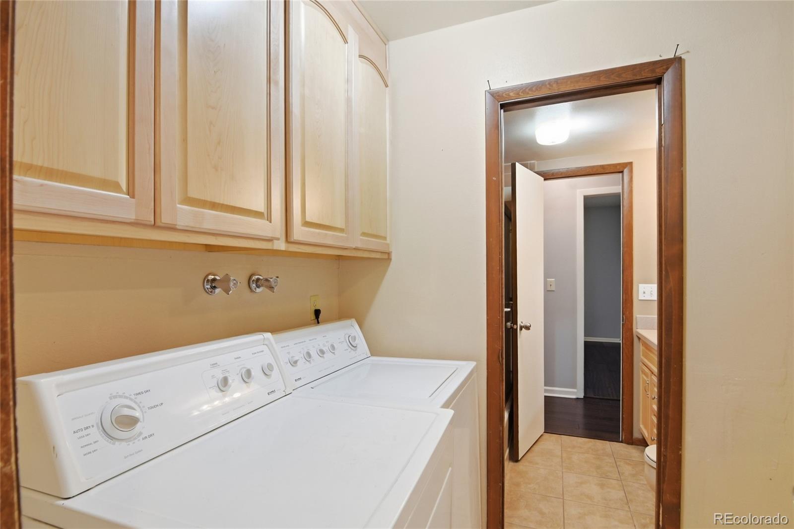 6136 High Drive Morrison, CO 80465 - Photo 26 of 40 a utility room with dryer and washer