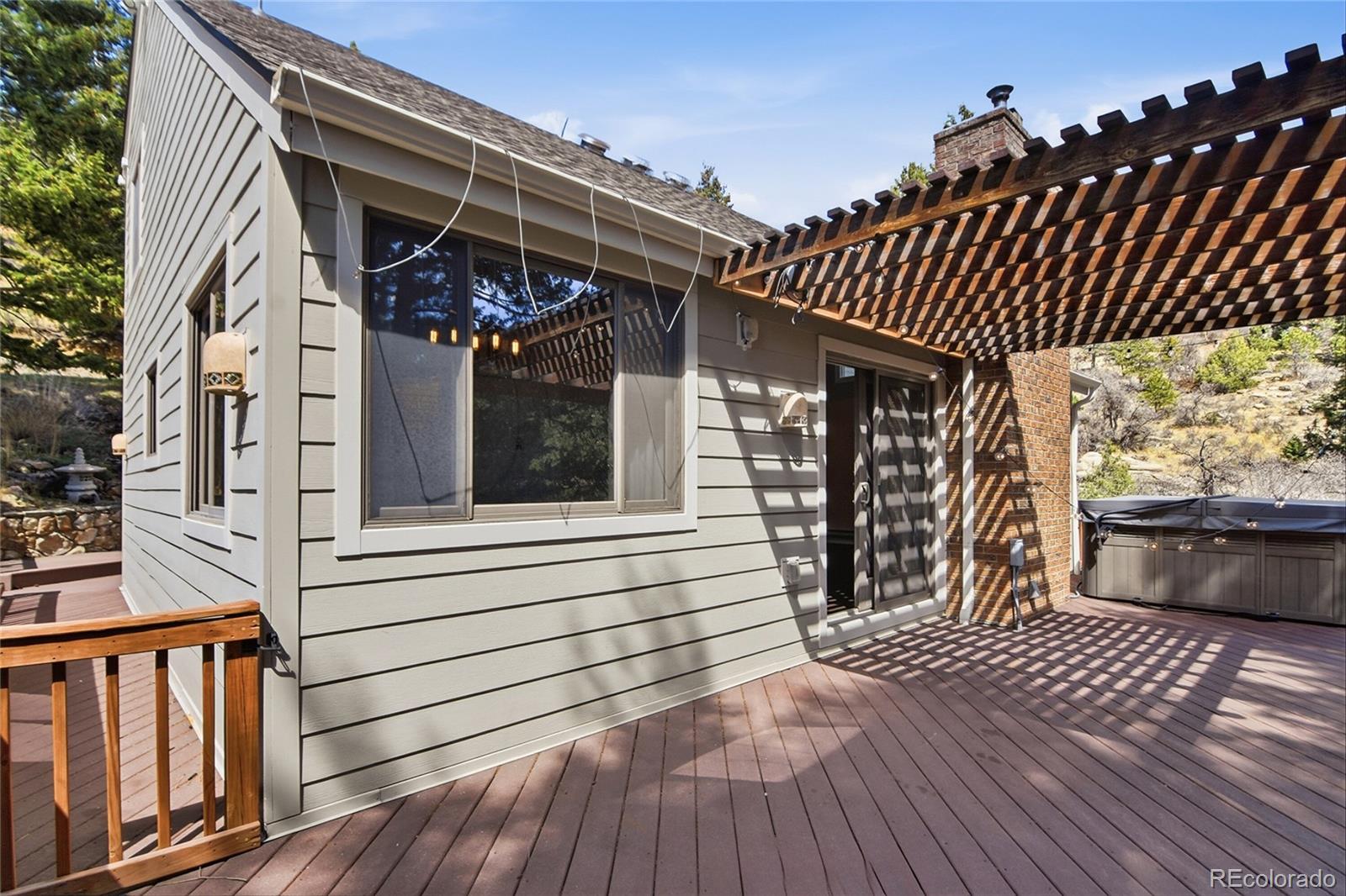 6136 High Drive Morrison, CO 80465 - Photo 27 of 40 a view of deck with patio