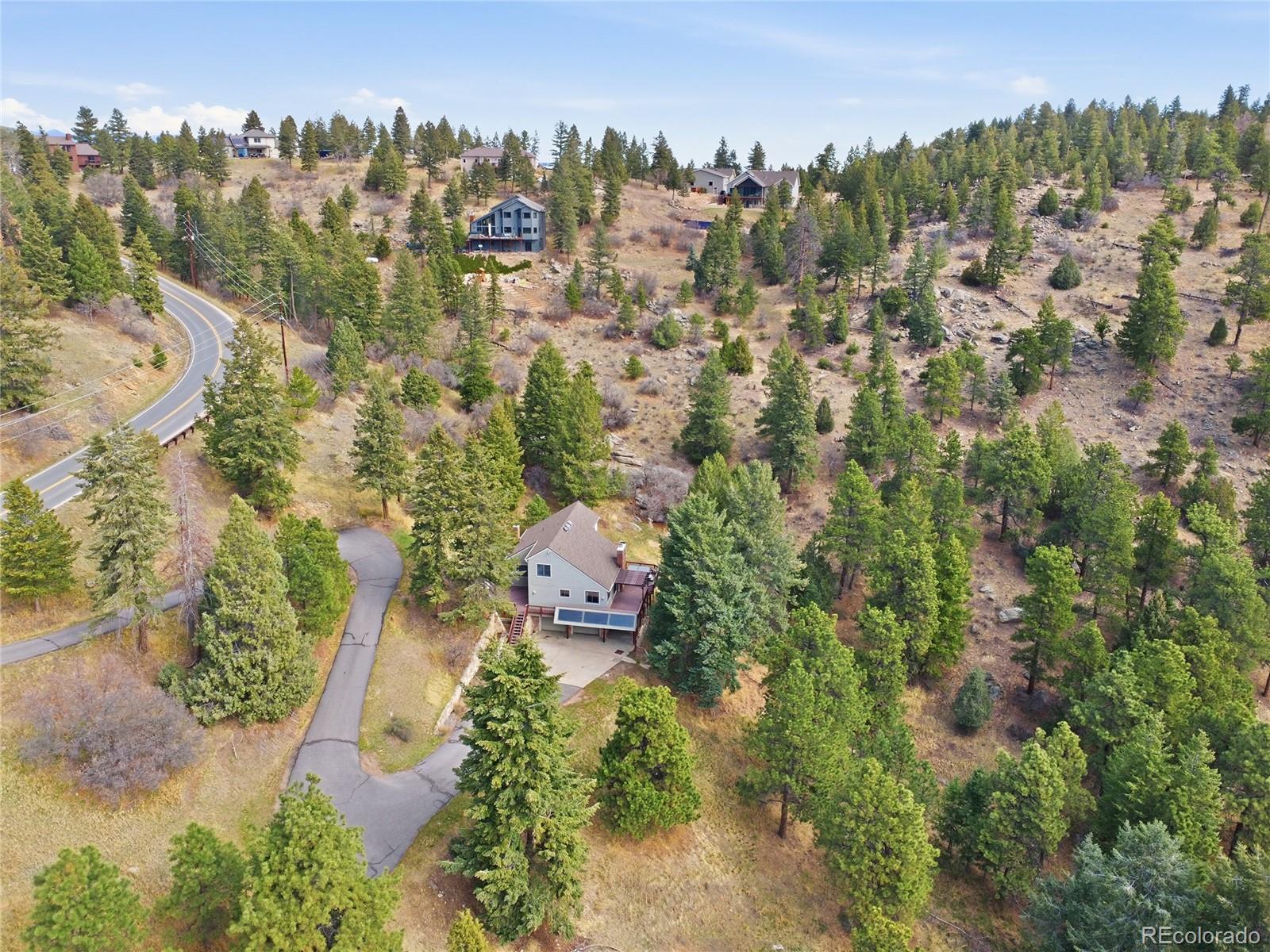 6136 High Drive Morrison, CO 80465 - Photo 30 of 40 an aerial view of a city with lots of residential buildings