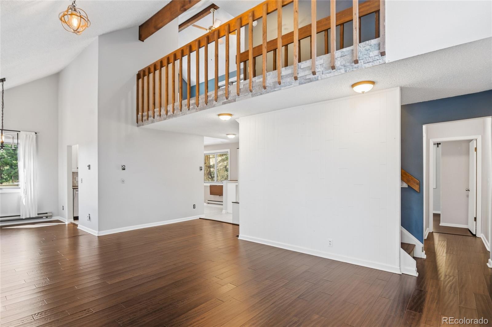 6136 High Drive Morrison, CO 80465 - Photo 8 of 40 a view of an entryway with wooden floor