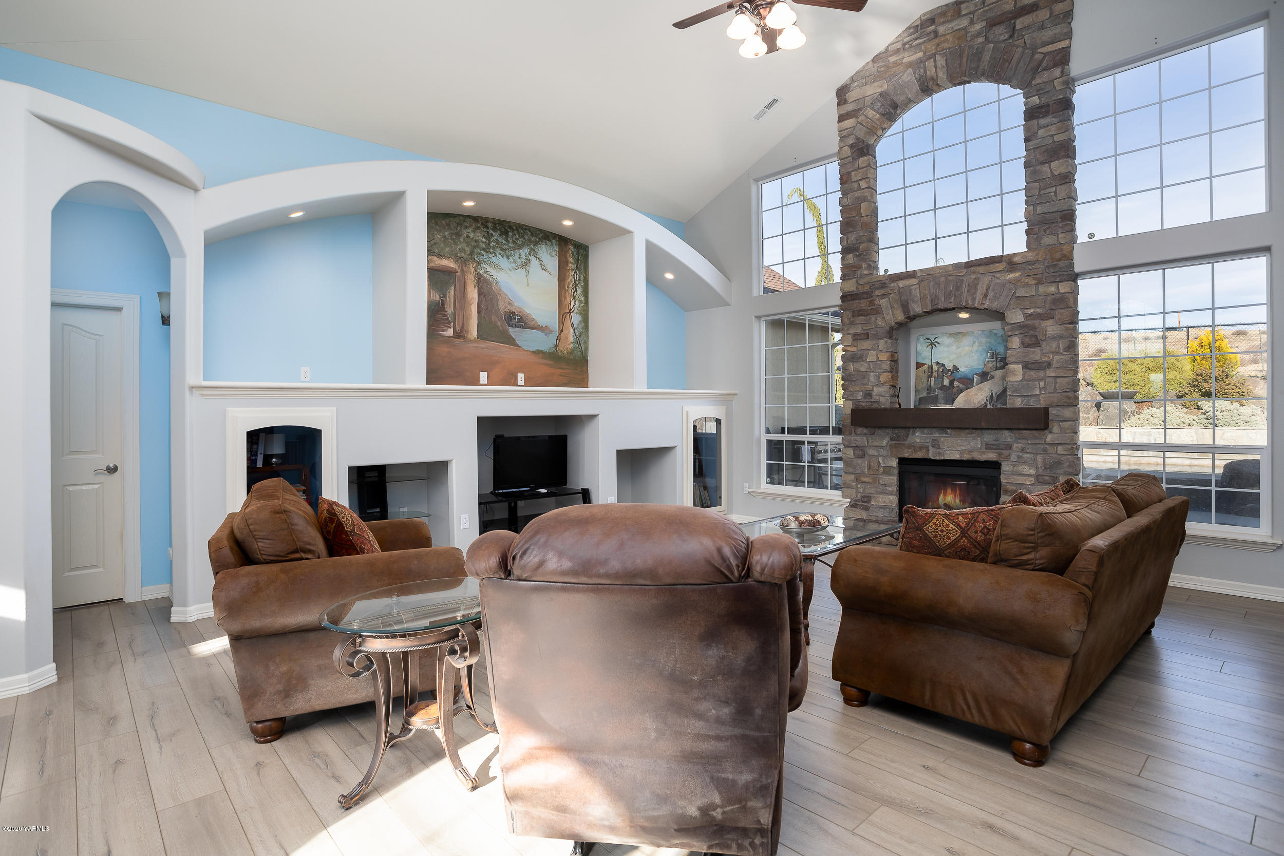 10903 Zier Road Yakima, WA 98908 - Photo 8 of 31 a living room with furniture and a fireplace