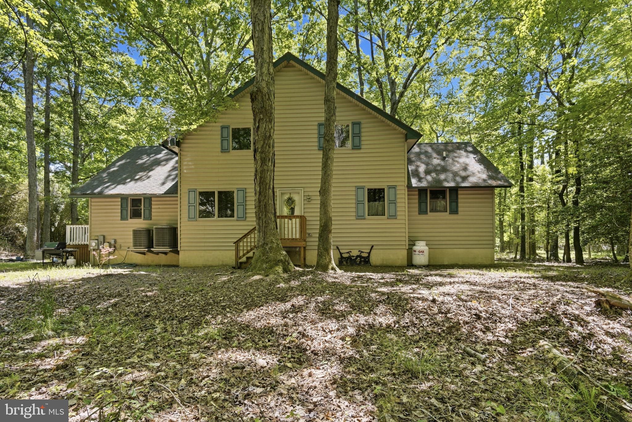 22300 Frazier Road Rock Hall, MD 21661 - Photo 30 of 38 a front view of a house with a yard