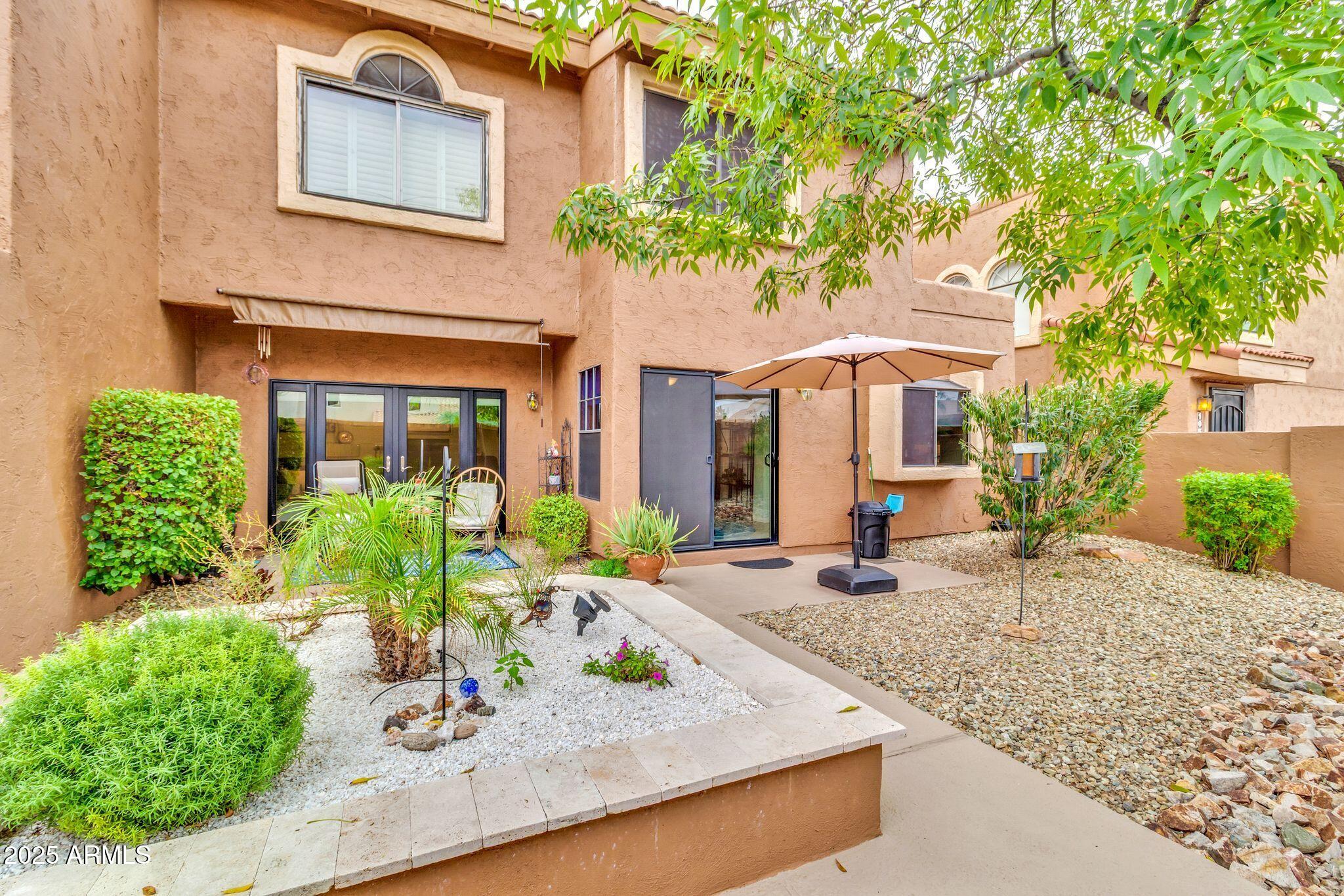 5640 East Bell Road, Unit 1055 Scottsdale, AZ 85254 - Photo 30 of 39 a house view with a sitting space