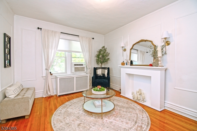 306 Springfield Avenue, Unit 3 Summit, NJ 07901 - Photo 1 of 20 a room with furniture and window