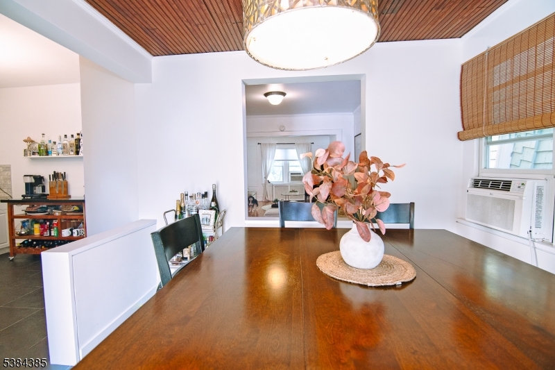 306 Springfield Avenue, Unit 3 Summit, NJ 07901 - Photo 11 of 20 a view of a dining room with furniture
