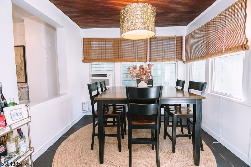 306 Springfield Avenue, Unit 3 Summit, NJ 07901 - Photo 10 of 20 a dining room with furniture and window