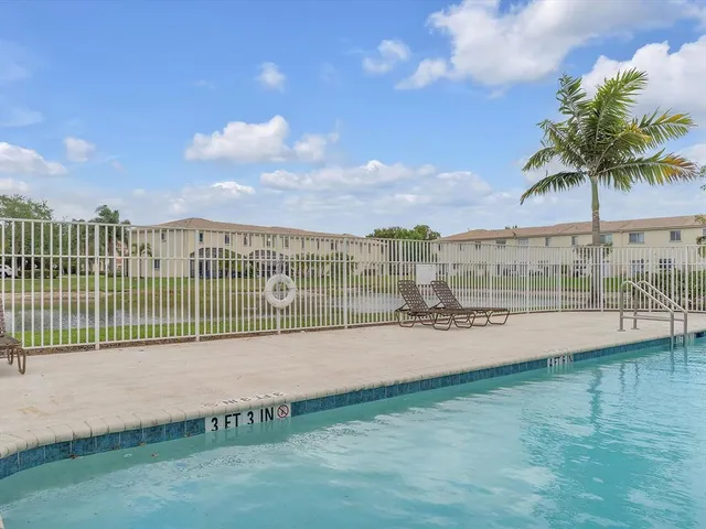 a view of a garden and ocean view