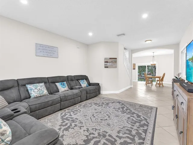 a living room with furniture and a couch