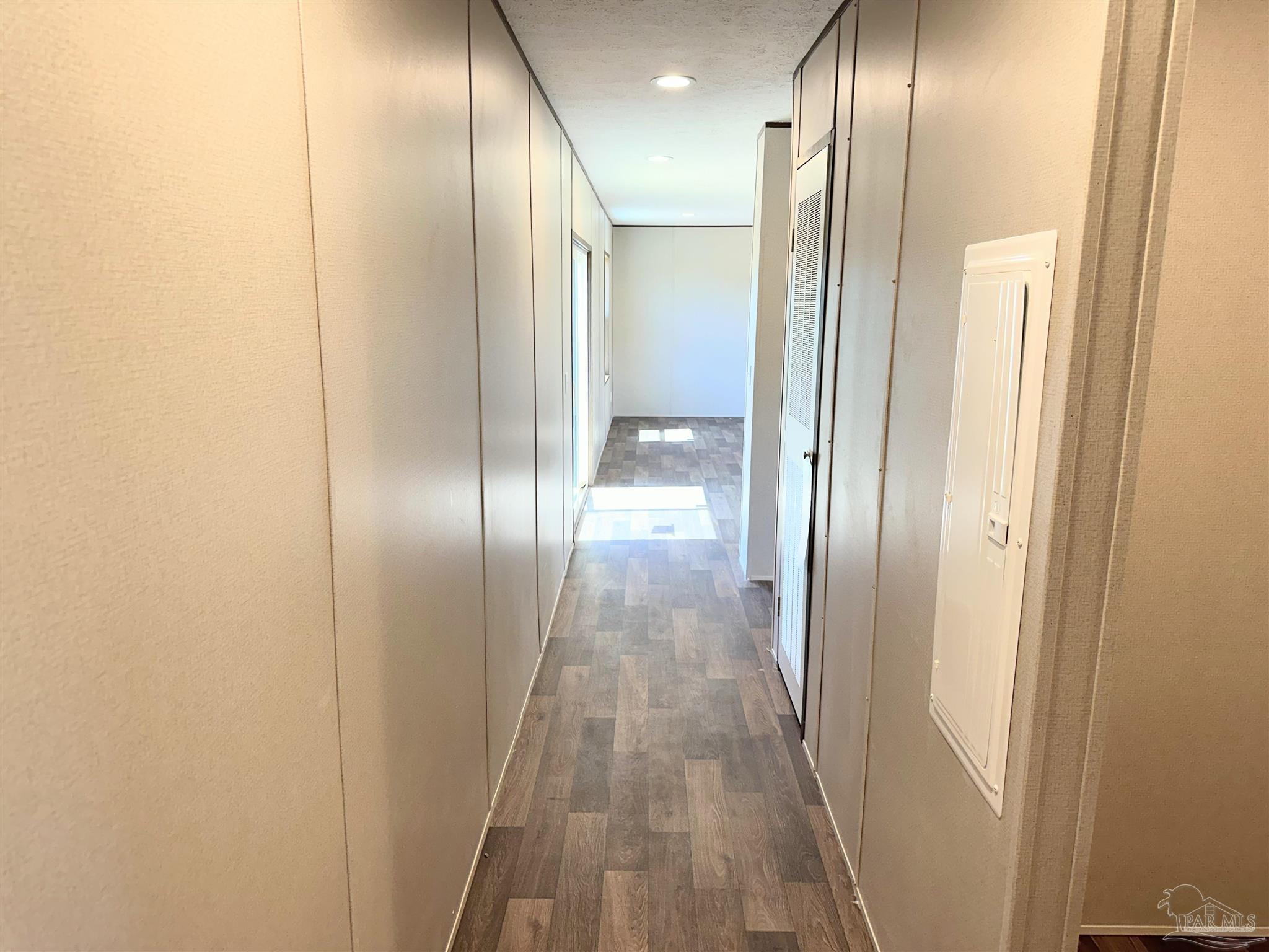 0 T Bridge Road Red Level, AL 36474 - Photo 13 of 25 a view of hallway with stainless steel appliances wooden floor and staircase