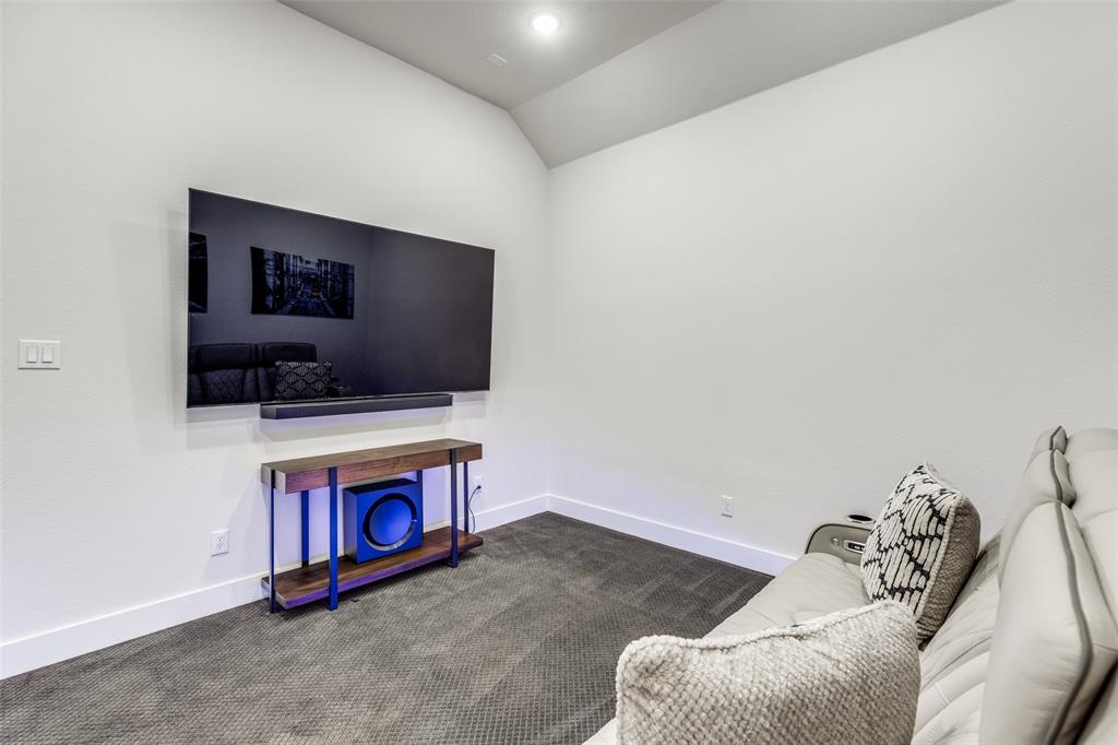 1835 Bell Court Van Alstyne, TX 75495 - Photo 18 of 39 Fully insulated media room with dimmed lighting and surround sound for a true home theater experience