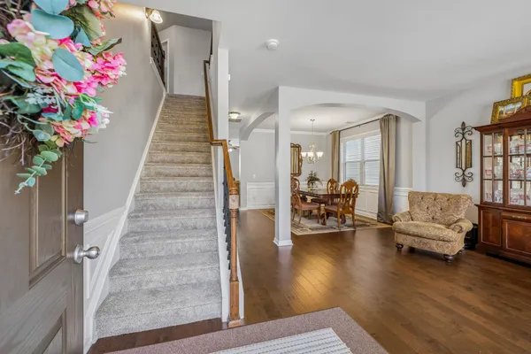 a room with furniture and wooden floor