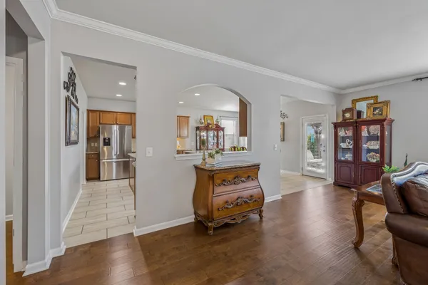 a kitchen with a stove top oven sink and cabinets