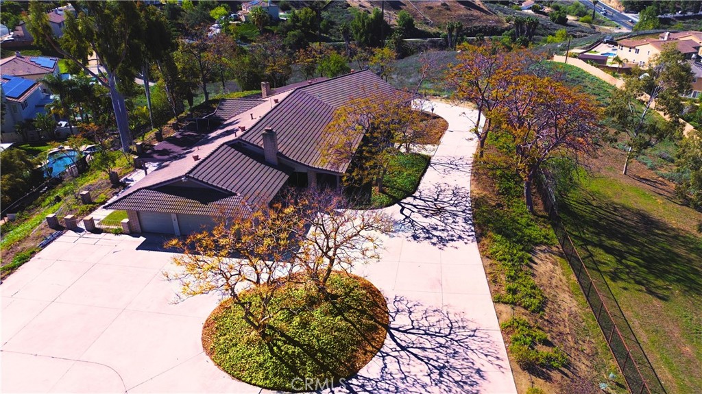 17250 Waugh Ranch Road Riverside, CA 92503 - Photo 3 of 16 a view of a swimming pool with a yard