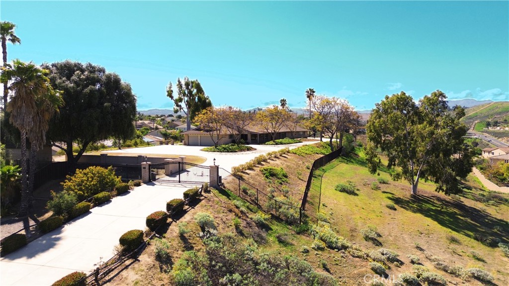 17250 Waugh Ranch Road Riverside, CA 92503 - Photo 5 of 16 a view of a water fountain in a backyard of the house