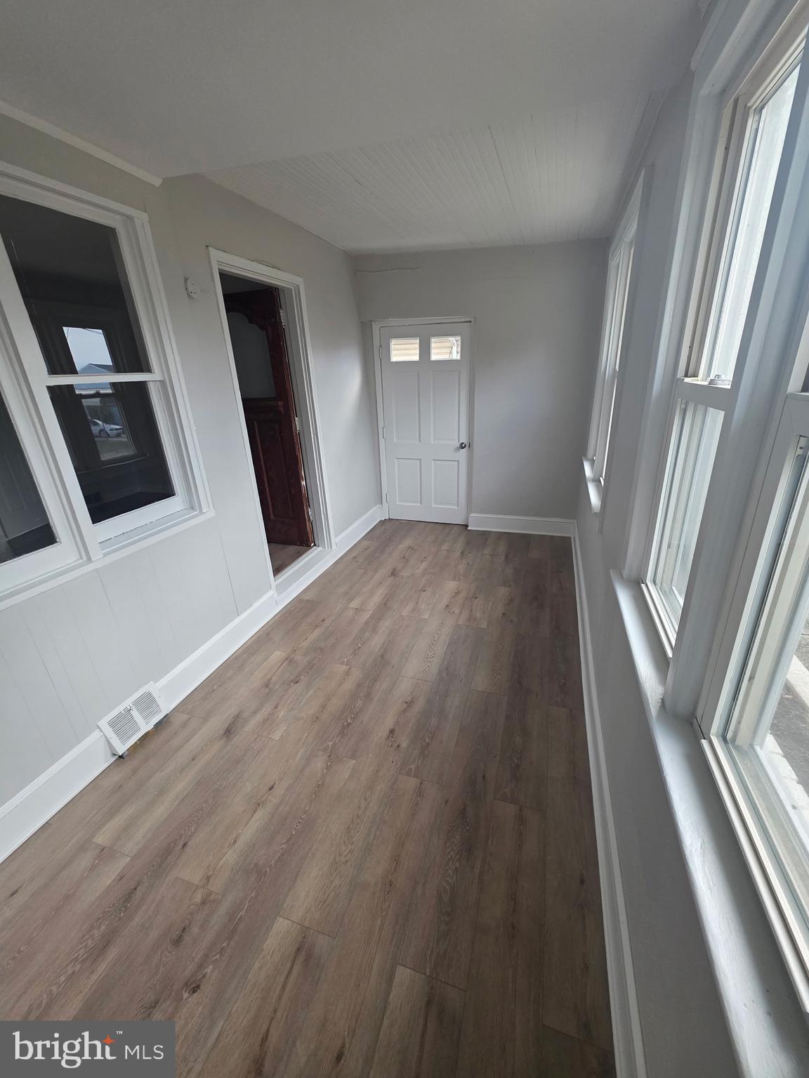 105 Mecray Lane Maple Shade, NJ 08052 - Photo 2 of 12 a view of an empty room and wooden floor