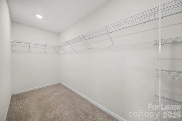 a view of a room with racks on the wall