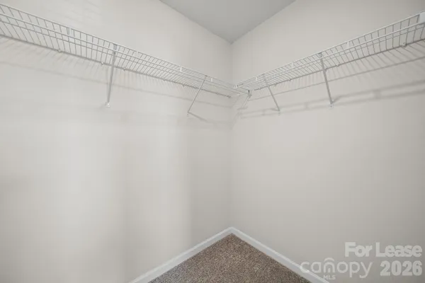 a view of a room with racks on the wall